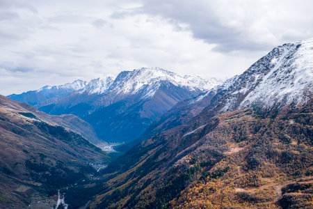 View from above on the slopes of the mountains, overgrown with forest in autumn. mountains, tourism....