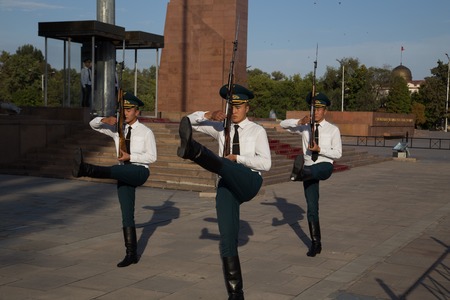 Bishkek, Kyrgyzstan - September 30, 2014: Procession of the hourly change of guards at the official...