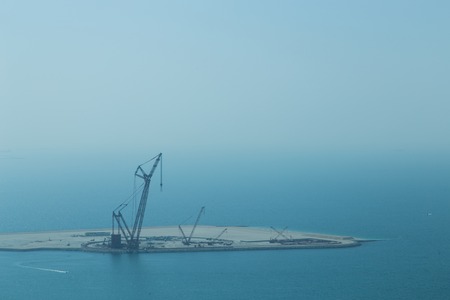 Construction site on a small island close to the coastline of Dubai.の写真素材