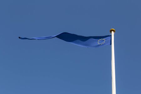 Photograph of a long and thin European flag.