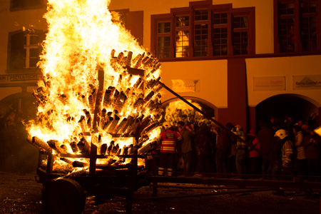 Liestal, Switzerland - March 09, 2014: Photograph of a burning cart at the traditional fire parade Chienbaese for Fasnacht.のeditorial素材