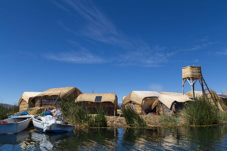Titino Islands, Titicaca Lake, Peru - October 14, 2015: Photograph of the less touristic Titino Floating Islands on the Titicaca Lake.のeditorial素材
