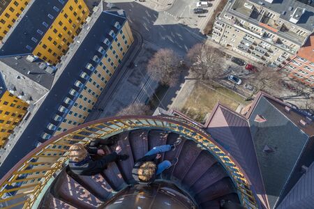 Copenhagen, Denmark - March 16, 2016: Tourists on the spiral stairs of Vor Frelsers Kirke in Copenhagen, Denmark.のeditorial素材