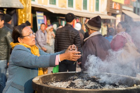 Kathmandu, Nepal - December 03, 2014: Pilgrims visiting the Buddhist Boudhanath Stupa.のeditorial素材