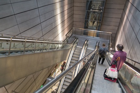 Copenhagen, Denmark - April 25, 2016: People using escalator in metro stationのeditorial素材
