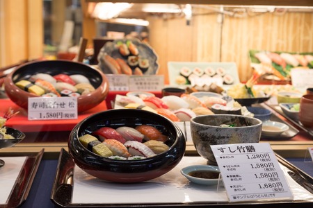 Osaka, Japan - December 9, 2014: Plastic food replicas in a restaurant windowのeditorial素材