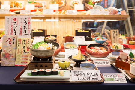 Osaka, Japan - December 9, 2014: Plastic food replicas in a restaurant windowのeditorial素材