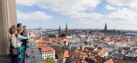Copenhagen, Denmark - August 15, 2016: People enjoying panoramic view over the city from the bell tower of Vor Frue Cathedralのeditorial素材