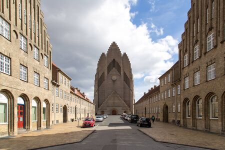 Copenhagen, Denmark - April 11, 2016: View of a road with Grundtvigs Church at the endのeditorial素材