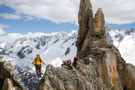 Goscheneralp, Switzerland - May 24, 2014: A Group of a climber on a Via Ferrata in Switzerlandのeditorial素材