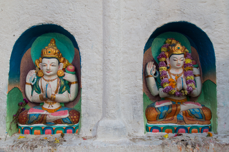 Small colorful buddhist statues at Boudhanath Stupaのeditorial素材