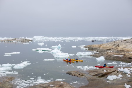 Kayaking in Ilulissat Icefjord, Greenlandのeditorial素材