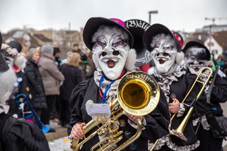 Basel, Switzerland - March 11, 2019: Participants at the parade of the yearly Carnival of Basel. The Carnival of Basel is the biggest carnival in Switzerland.のeditorial素材