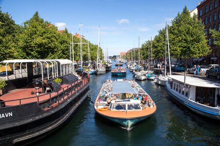 Copenhagen, Denmark - August 17, 2016: Tourist boats and sailboats in Christianshavn channel on a summer dayのeditorial素材