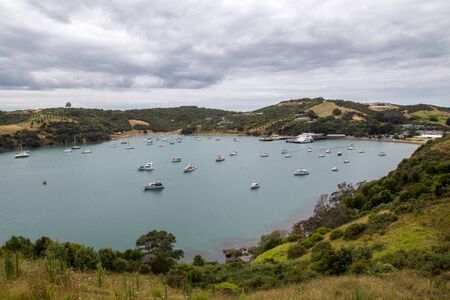 Waiheke Island, New Zealand - February 09, 2015: Yachts and sailing boats moored in Matiatia Bayのeditorial素材