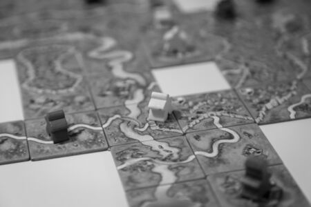 Basel, Switzerland - February 05, 2017: Close up of the popular board game Carcassonne in black and white.のeditorial素材