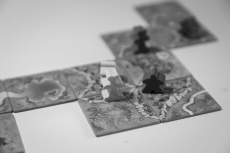 Basel, Switzerland - February 05, 2017: Close up of the popular board game Carcassonne in black and white.のeditorial素材