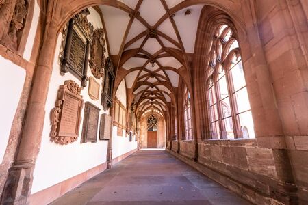 Basel, Switzerland - March 10, 2019: The cloister at the Basel Minster. The Basel Minster is one of the main landmarks and tourist attractions of the Swiss city of Basel.のeditorial素材