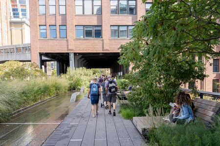 New York, United States of America - September 21, 2019: People stroll along the High Line Park in Manhattan. The urban park is popular by locals and tourists built.のeditorial素材