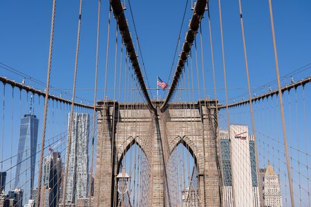 Famous view of the historic Brooklyn Bridge in New York City.の写真素材