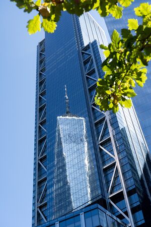New York, United States of America - September 19, 2019: Reflection view of the One World Trade...