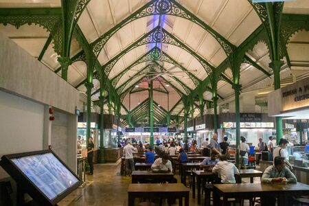 Singapore, Singapore - February 02, 2015: People enjoying food at the Lau Pa Sat foodcourt.のeditorial素材