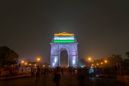 New Delhi, India - December 13, 2019: People in front of the illuminated India Gate at night.のeditorial素材