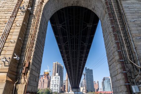 New York, United States of America - September 23, 2019: Arch under the Queensboro Bridge connecting Manhattan and Queens.のeditorial素材