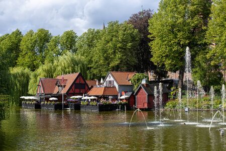 Copenhagen, Denmark - August 10, 2019: Restaurant at a lake in Tivoli Gardens.のeditorial素材