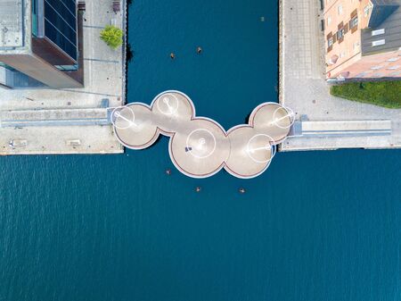 Copenhagen, Denmark - May 27, 2019: Aerial drone view of the modern Circle Bridge, a pedestrian bridge in the harbour area.のeditorial素材