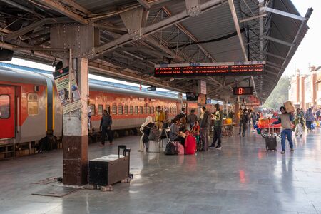 Jodhpur, India - December 10, 2019: People on a platform at Jodhpur train station.