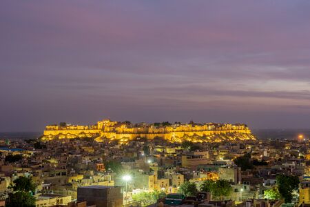 Jaisalmer, India - December 5, 2019: The illuminated Jaisalmer Fort during sunset.のeditorial素材