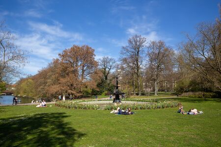 Malmo, Sweden - April 20, 2019: People relaxing in Kings Park on a sunny day.のeditorial素材
