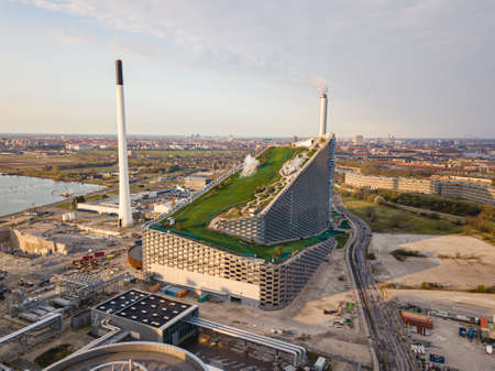 Copenhagen, Denmark - April 12, 2020: Aerial drone view of Amager Bakke, a waste to power plant with a ski slope on top.のeditorial素材