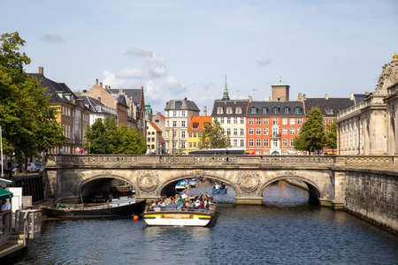 Copenhagen, Denmark - August 22, 2019: Marble Bridge over Frederiksholm Canal in the historic city...