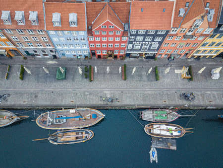 Copenhagen, Denmark - April 07, 2020: Aerial drone view of the famous Nyhavn district in the historic city centre.のeditorial素材