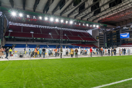 Copenhagen, Denmark - December 22, 2020: People queuing at the corona test facility at the national stadium.のeditorial素材