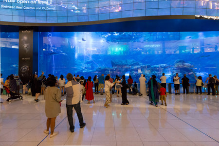 Dubai, United Arab Emirates - July 19, 2018: People infront of the huge Dubai Mall Aquariumのeditorial素材