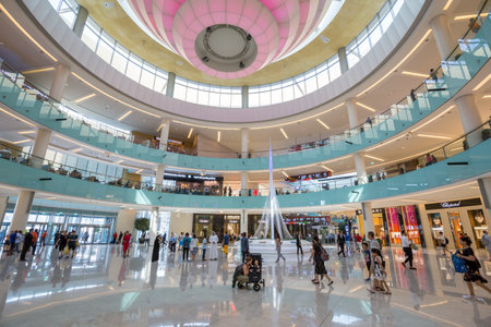 Dubai, UAE - July 19, 2018: People inside the Grand Atrium inside Dubai Mallのeditorial素材