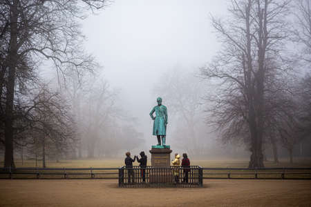 Copenhagen, Denmark - March 3, 2021: People on a foggy day in Frederiksberg Gardens.のeditorial素材
