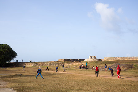Group of men playing cricket in Galle Fortのeditorial素材