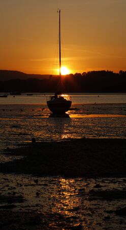 On the beach in Devon at sutset の写真素材