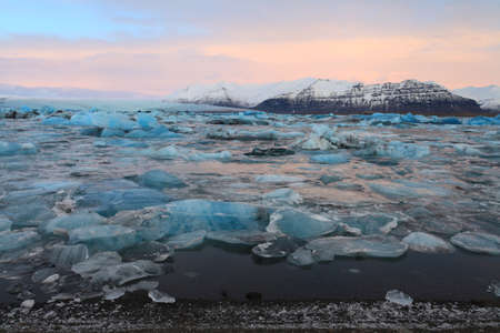 The glacier lagoon at sunrise in vatnajokull national parlの写真素材
