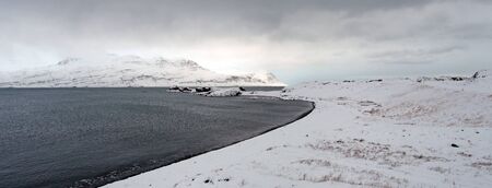 The hostile frozen landscapes of the east fjords in Icelandの写真素材
