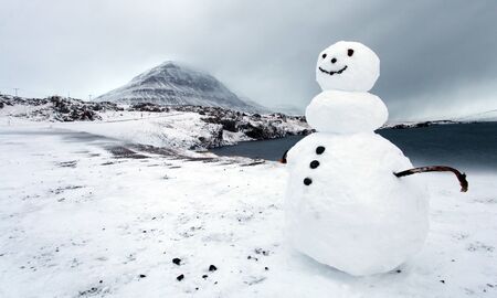 East fjords in Iceland and a winter snowmanの写真素材