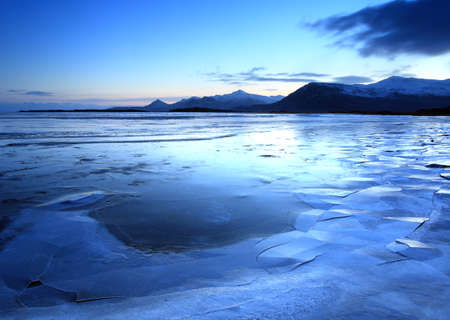 Iceland in twilight over the mountain range nd lakesの写真素材