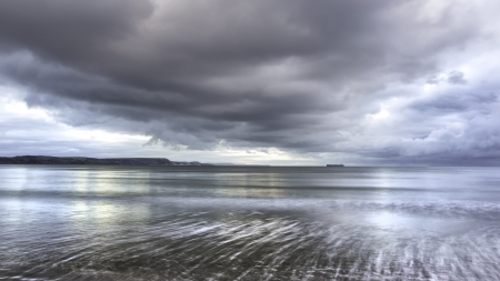 Cold Winter Cloudy Skies over Dorest Beachの写真素材