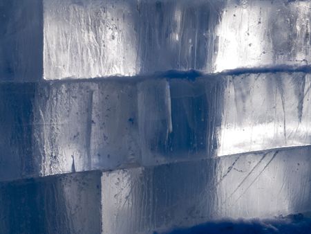 big translucent ice blocs in the sunshine: preparations for the ice sculpture festival