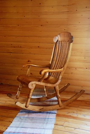 carved wooden rocking-chair in the country-style interior                                     の写真素材
