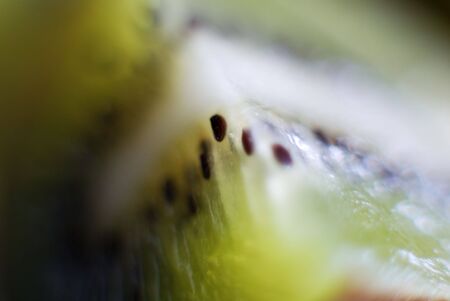 close-up of piece of pulp fresh kiviの写真素材